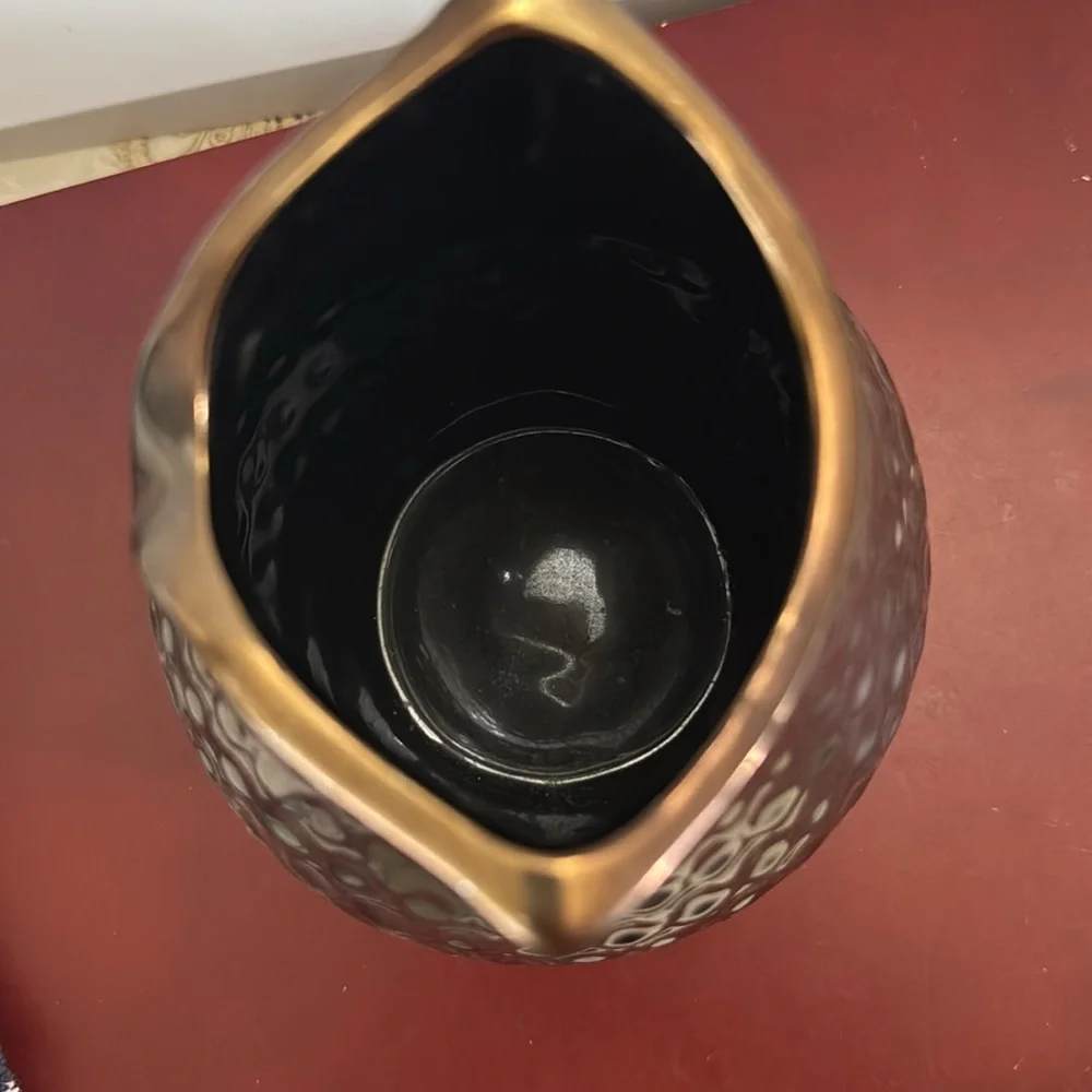 Copper/Bronze colored ceramic owl vase with a dimpled, metallic finish